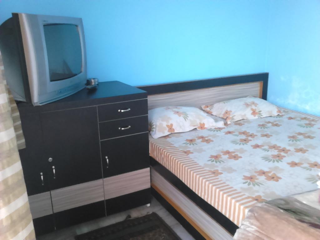 Leela Guest House Варанаси Стая снимка