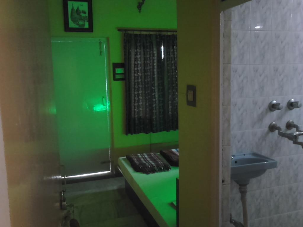 Leela Guest House Варанаси Стая снимка